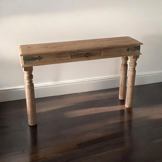 Rustic wooden console table with drawer and turned legs on dark flooring, Bert Joseph furniture