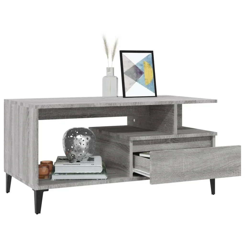 Modern grey wood side table with open shelf, drawer, and black legs, styled for Bert Joseph home furniture