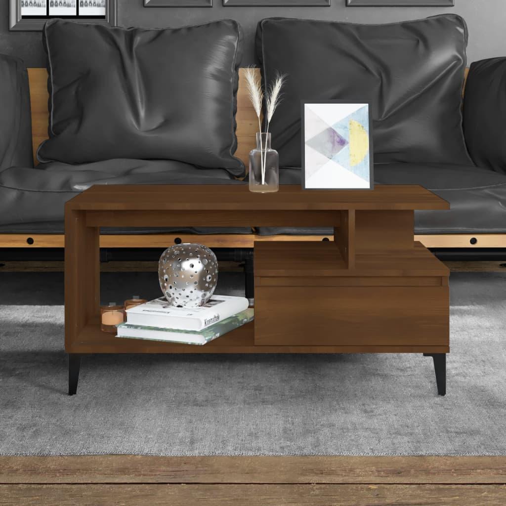 Modern walnut wood coffee table with storage, styled in front of dark grey sofa, Bert Joseph furniture