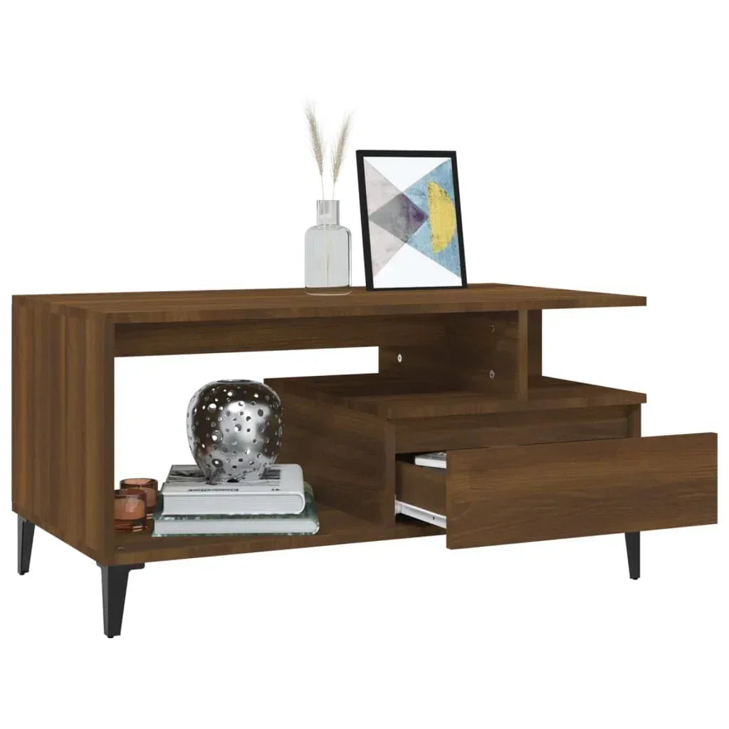 Modern walnut wood coffee table with open shelves, drawer storage, and black legs, styled with vase and decor