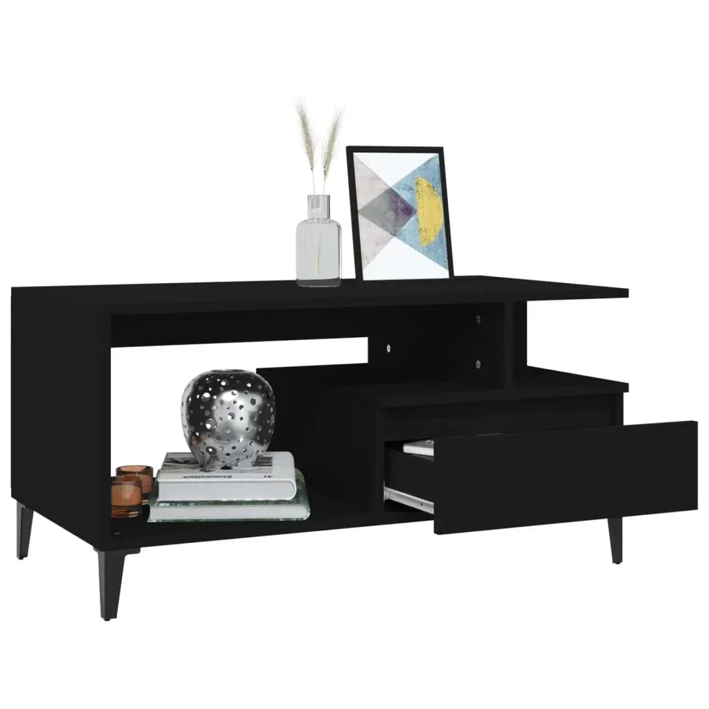 Modern black wood TV stand with open shelf, drawer, and decorative items, Bert Joseph furniture