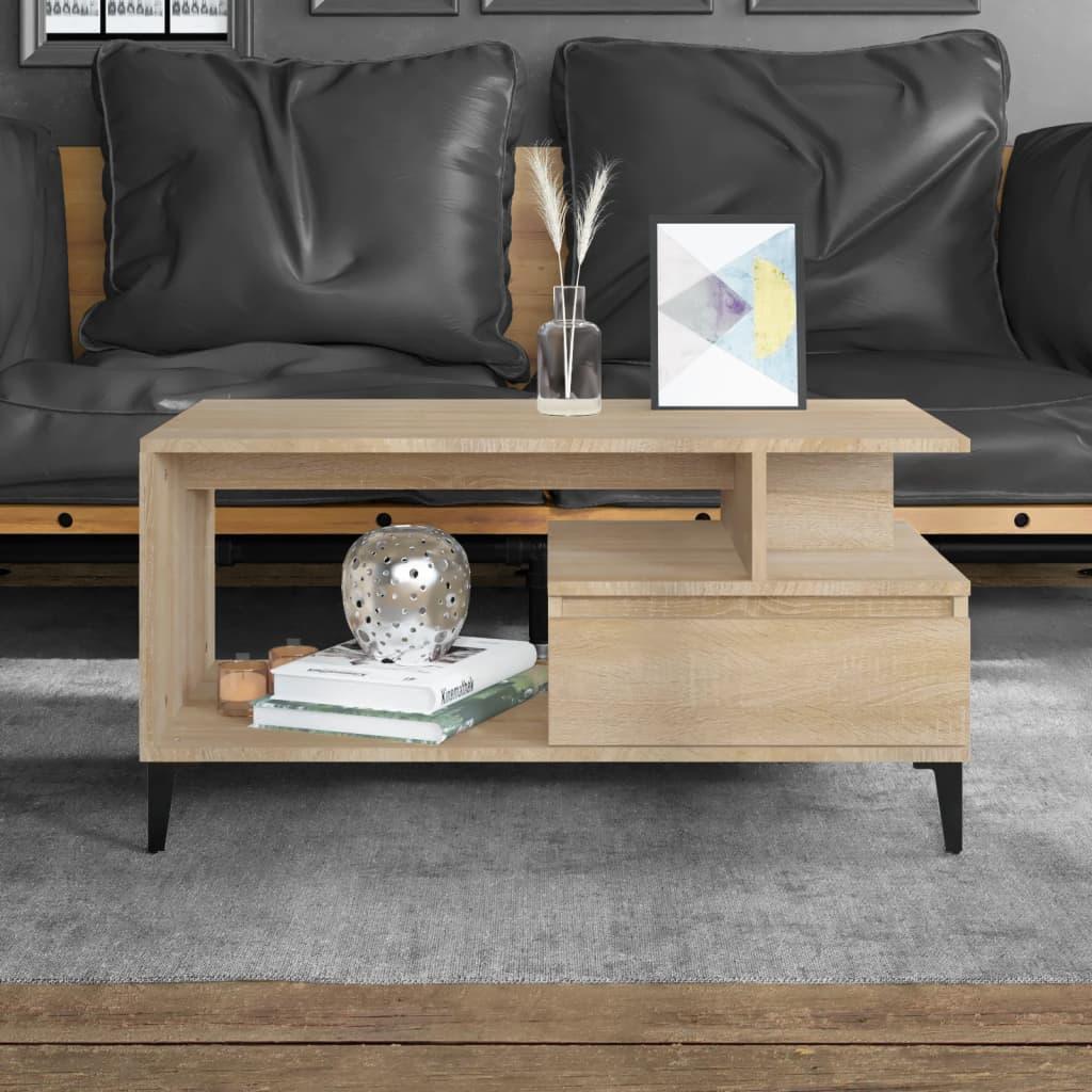 Modern light wood coffee table with open shelf and drawer, styled with decor, on grey rug
